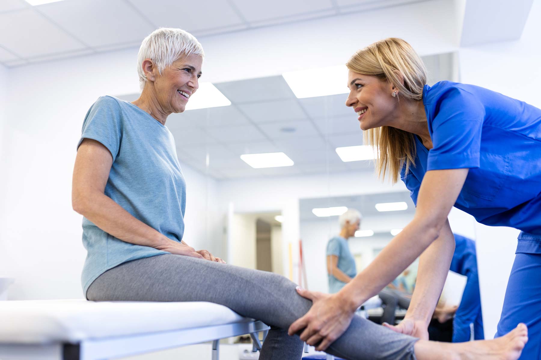 Medical assistant trainee working with a patient at Community Health